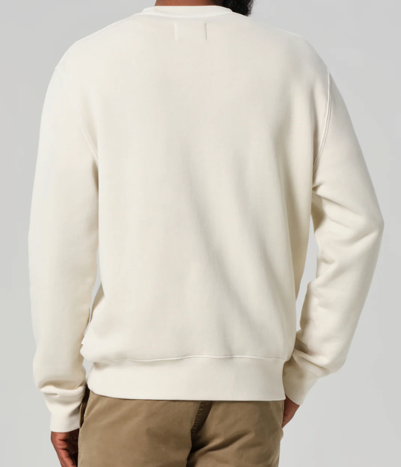 Vintage crewneck sweatshirt in 100% organic cotton, offering a structured fit and comfortable lived-in feel, with model measurements and size details