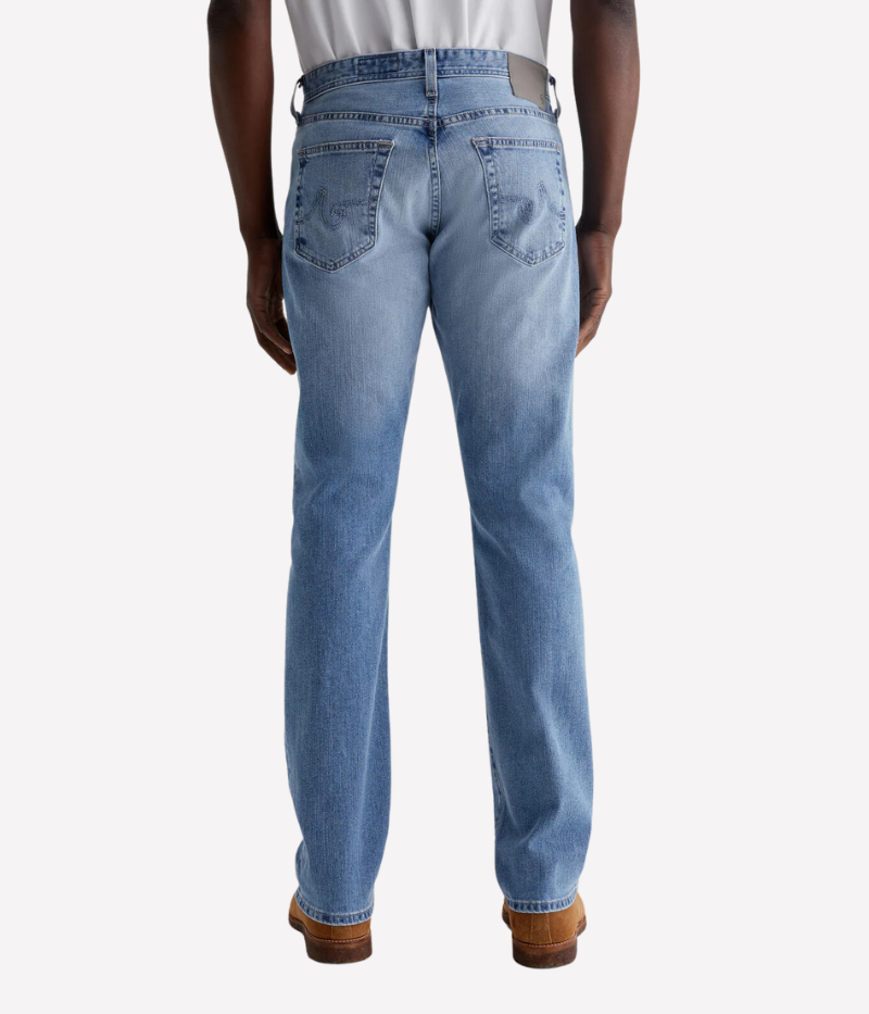 Everett slim-straight jean in stretch-blend 11 oz. Lead Denim from Japan, featuring a mid-rise waist and a straight fit that tapers slightly at the leg openings. Designed with a five-pocket style and detailed measurements: 10 1/4" front rise, 16 1/2" knee opening, 15" bottom opening, and 34" inseam.