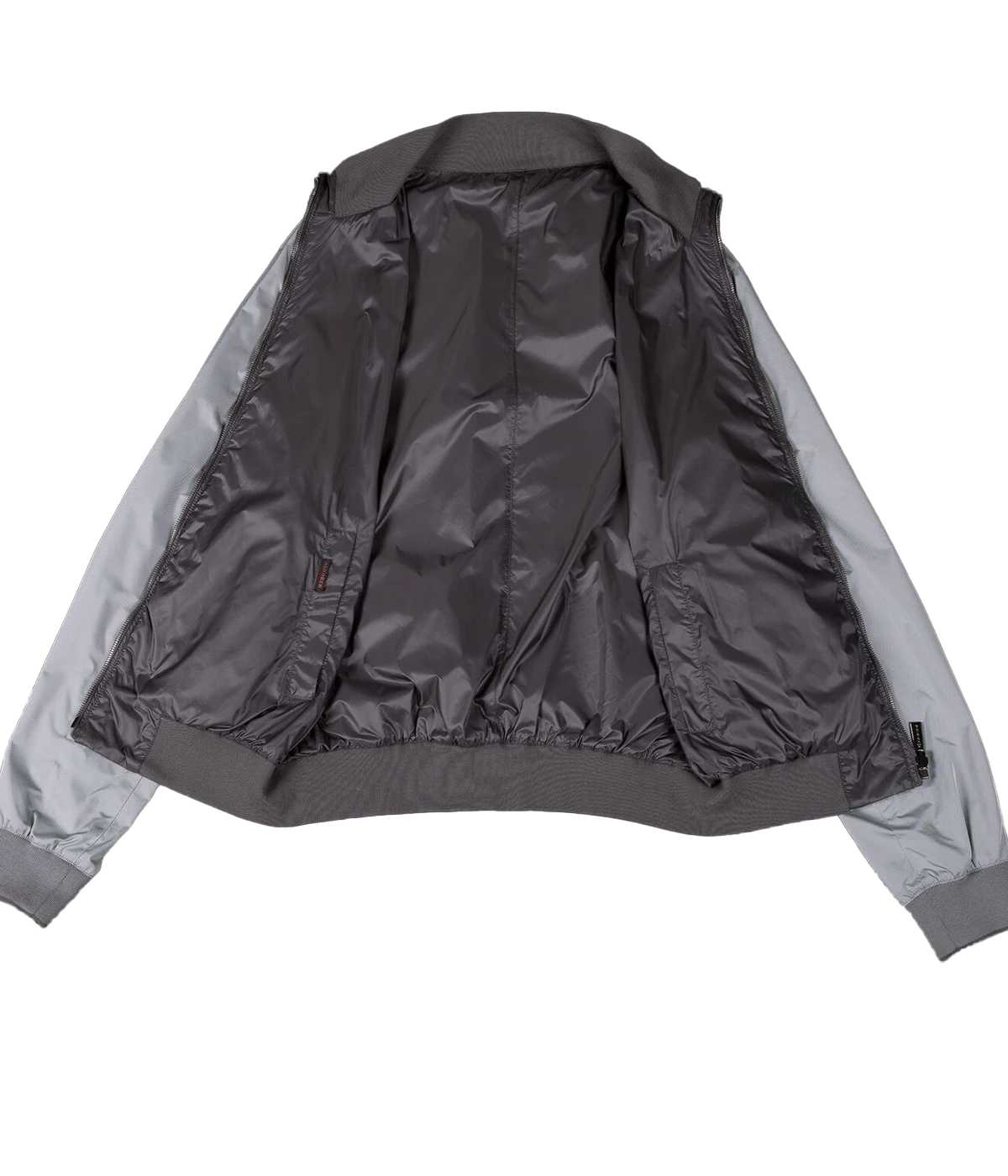 Ice/cloud reversible bomber jacket with zip closure, ribbed collar, cuffs, and hem, plus zip pockets on both sides. Made in Italy.