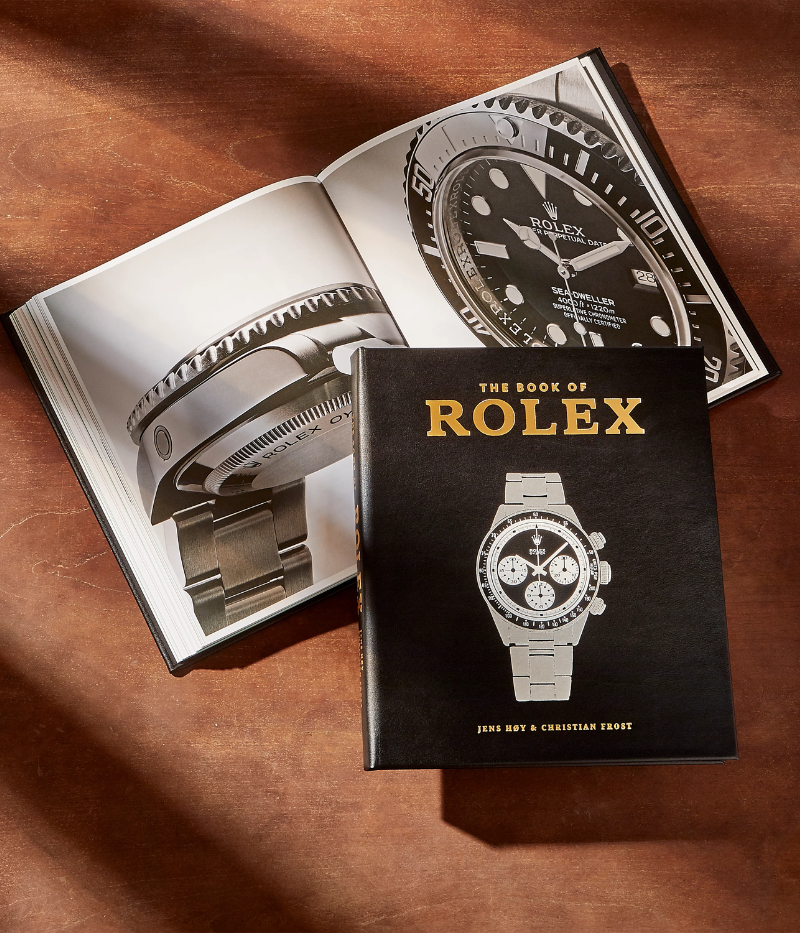 Luxury book on Rolex watches, hand-bound in bonded leather, featuring 200 pages on vintage models, special editions, and expert authentication tips.