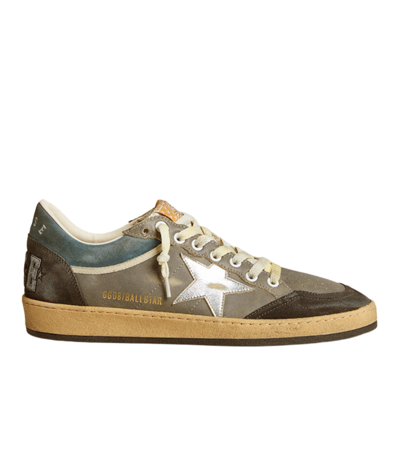 Golden Goose Ball Star Sneaker in grey and anthracite, featuring a leather and suede upper with a suede toe and laminated star detail. Set on a durable rubber sole with a breathable lining for all-day comfort. Italian-made with a blend of high-end craftsmanship and street-style edge.