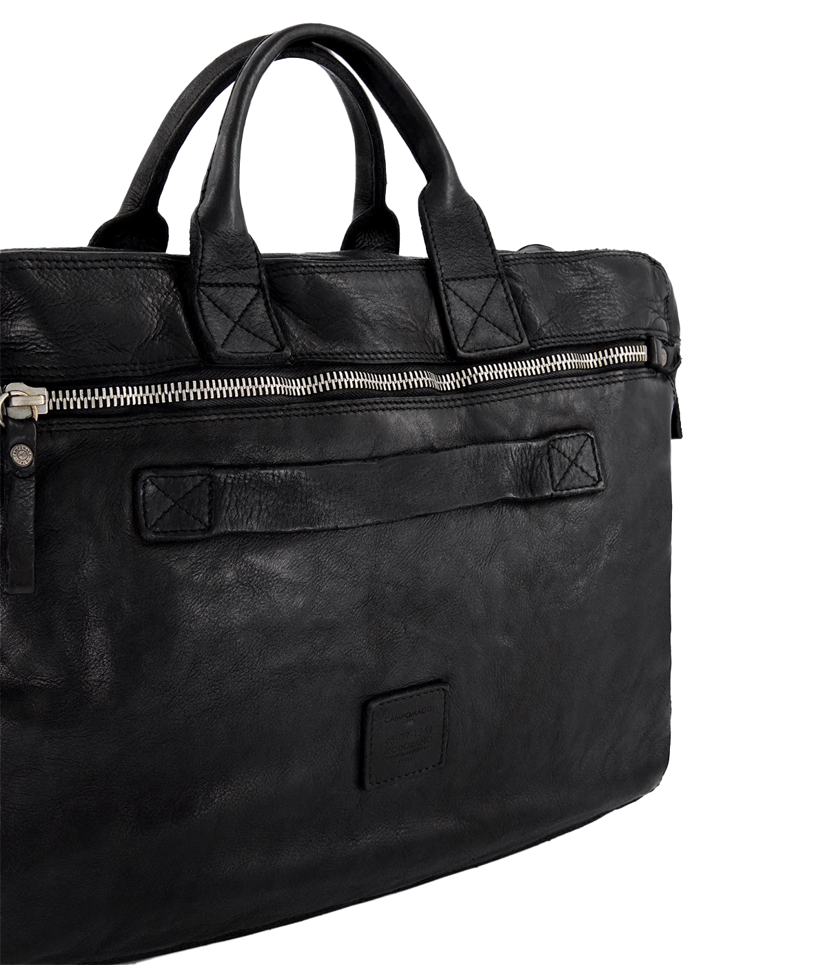 The Campomaggi Leather Briefcase in black is crafted from full-grain Italian leather with a rich, hand-dyed finish. Featuring sturdy top handles, a detachable shoulder strap, and a spacious interior, it’s a timeless blend of function and craftsmanship, perfect for work or travel.