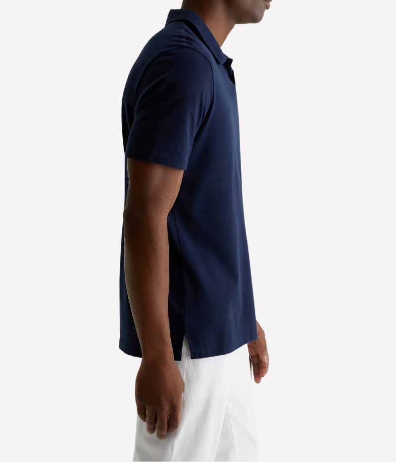 Side profile of the Bryce Johnny Collar polo shirt, showcasing the relaxed fit and smooth finish of the lightweight cotton jersey.