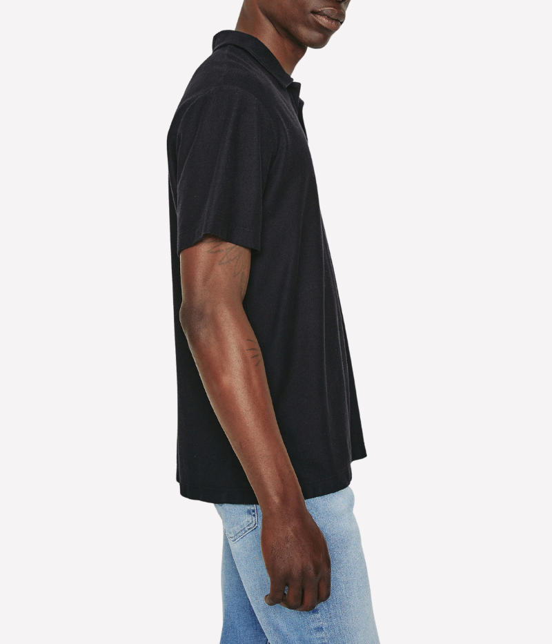 Side view of the AG Bryce Johnny Collar Polo Shirt, showcasing the subtle texture created by the tiny terry loops on the reverse side. The lightweight fabric and relaxed fit make it an effortlessly stylish and comfortable option.