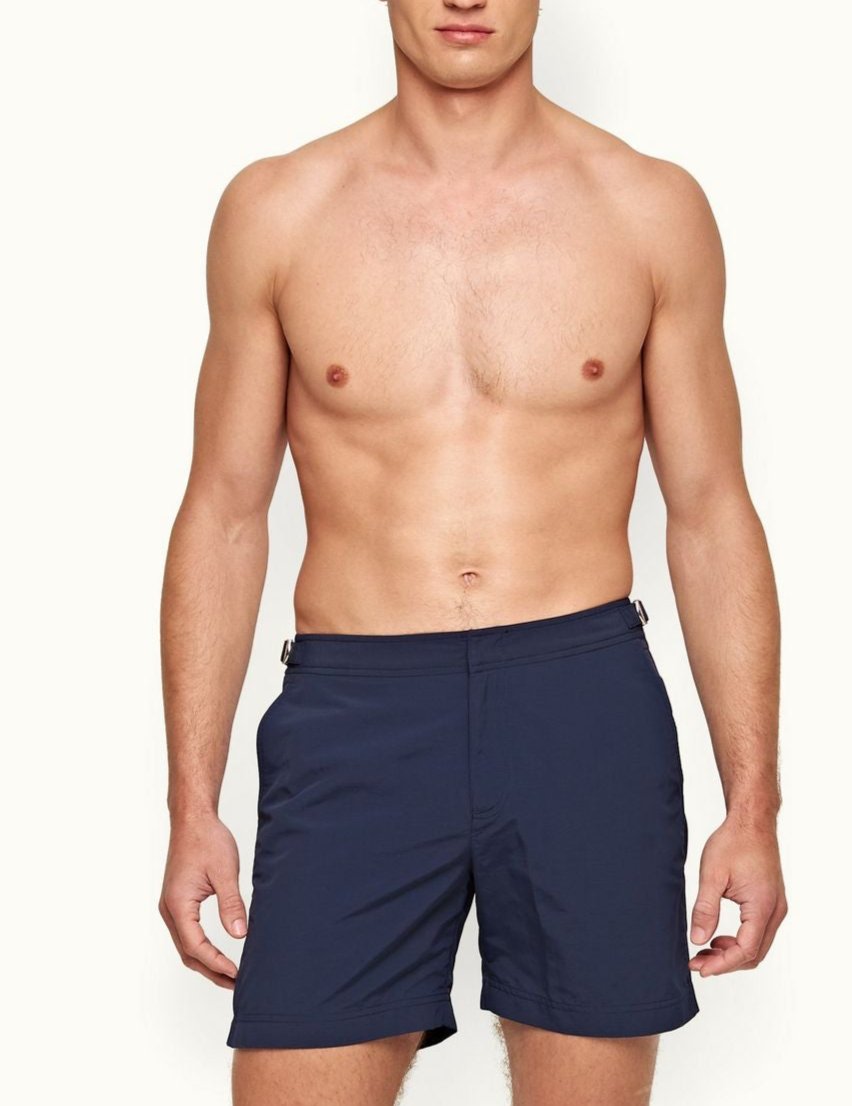 Orlebar Brown Bulldog Swim Shorts in Navy, featuring a tailored fit with signature side-fasteners and a mid-length cut for timeless summer style.