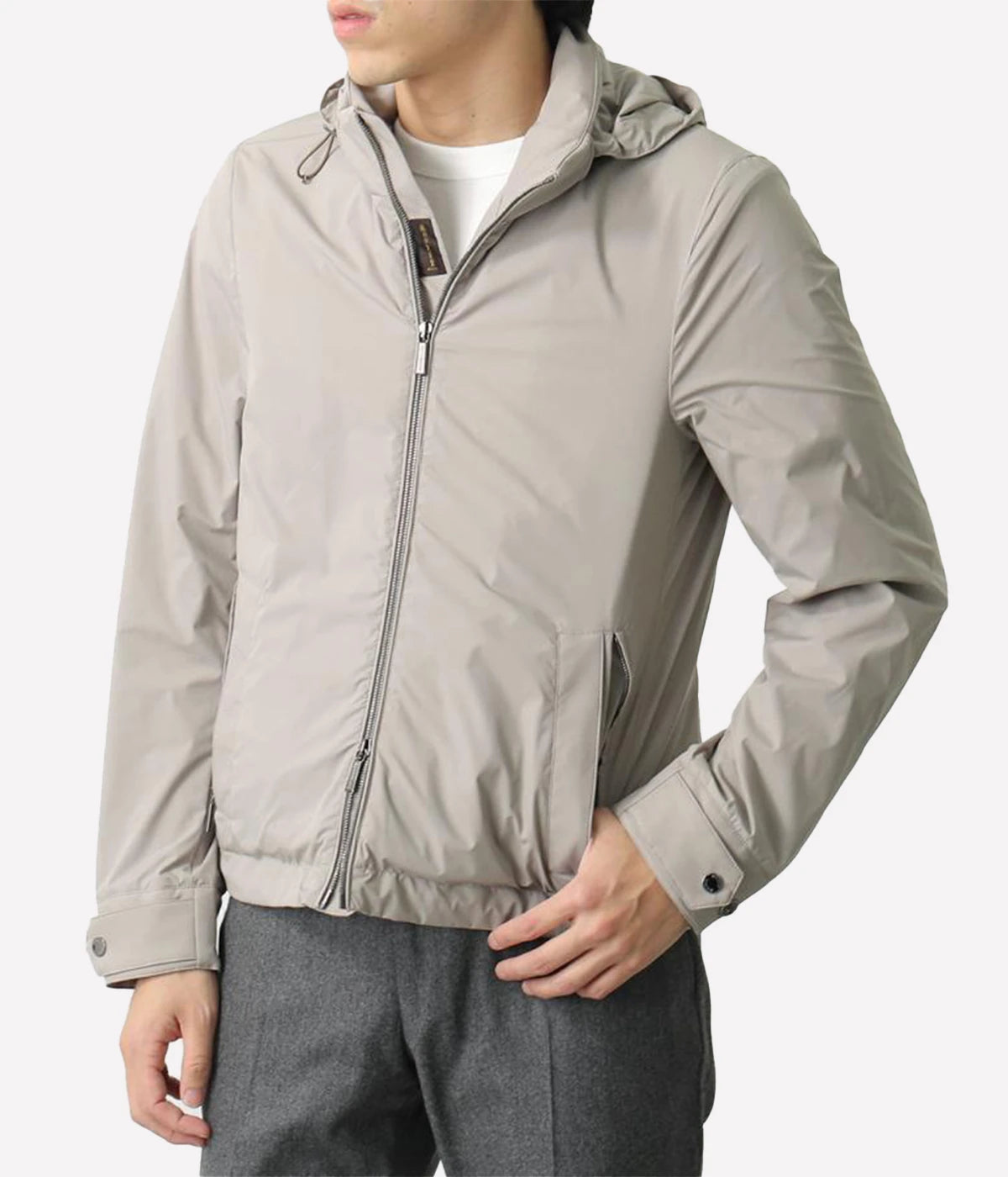 Duccio Jacket in Marmo by MooRER, a water-repellent stretch anorak with a detachable hood, double-zip front, dual-entry side pockets, adjustable cuffs, and a drawstring hem. Lined with mélange jersey. Made in Italy.