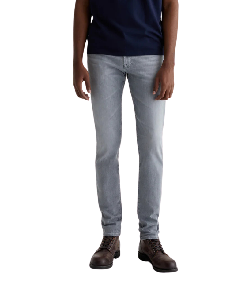 Men's slim skinny Dylan jeans in light grey wash with subtle fading and whiskering, cut slim through the thighs and tapered at the ankle for a sleek, modern fit. Crafted from 10 oz. Ashen Stretch Denim for a premium, comfortable feel.