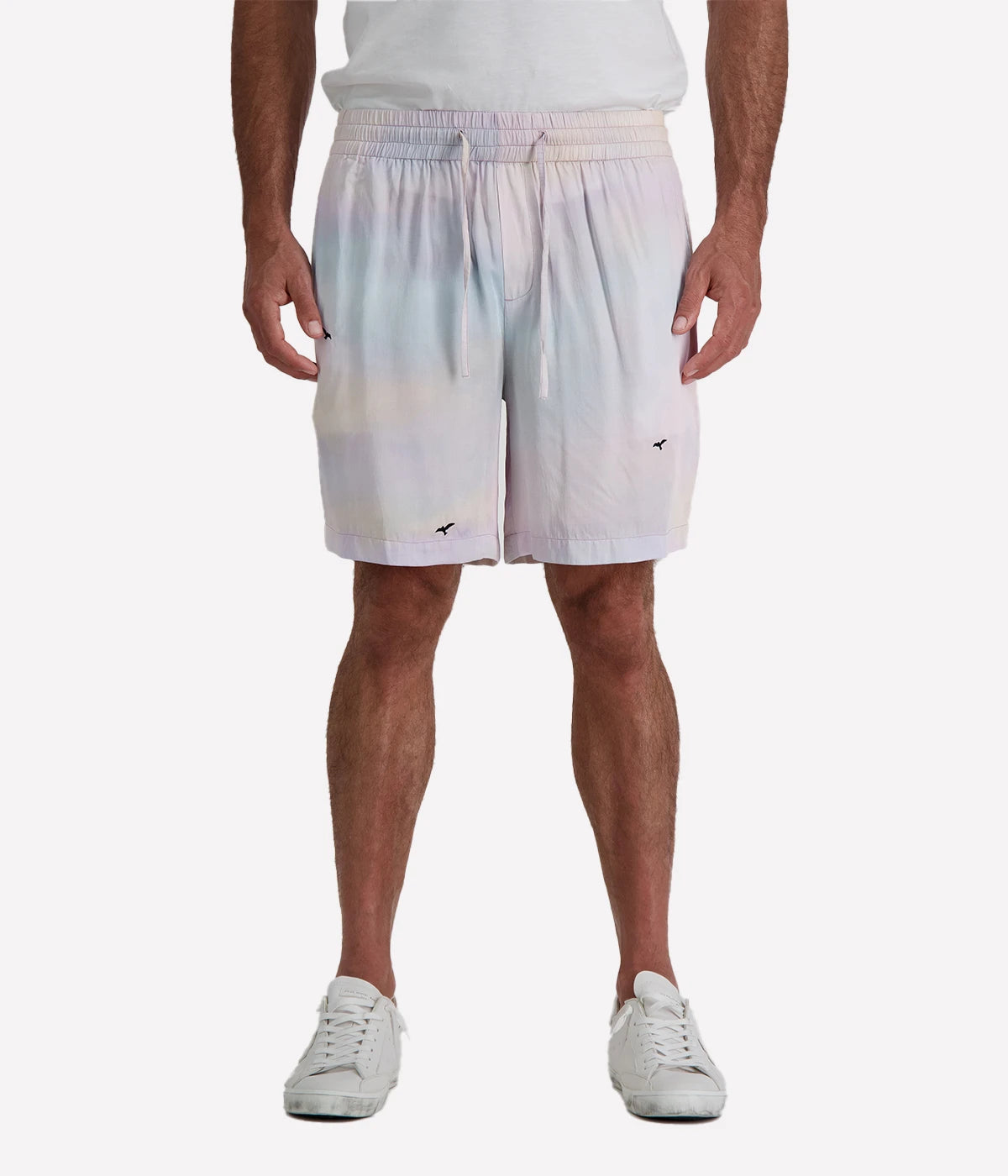 Light purple gradient casual shorts by Perte D’ego, featuring an elasticated waistband, adjustable drawstring, and a subtle bird print. Made from a lightweight fabric for effortless summer style.