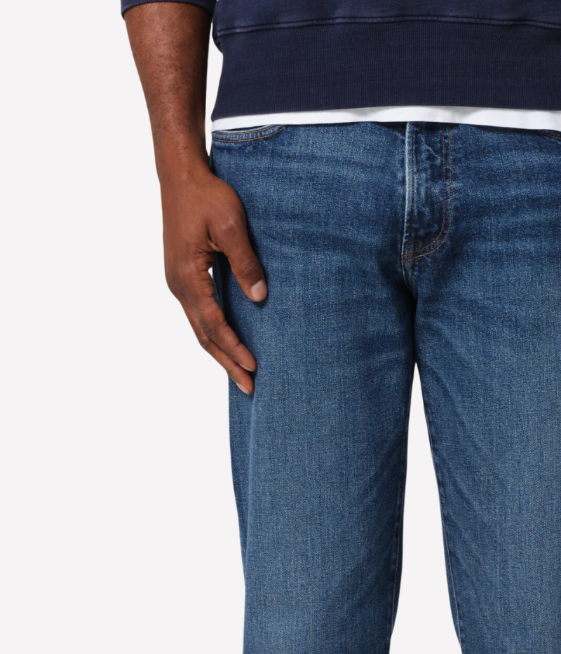 Citizens of Humanity Elijah Jean in bright medium indigo with whiskering and fading. This relaxed, straight-leg denim offers a comfortable fit through the hip and leg, crafted from signature comfort stretch heavyweight denim for all-day wear.