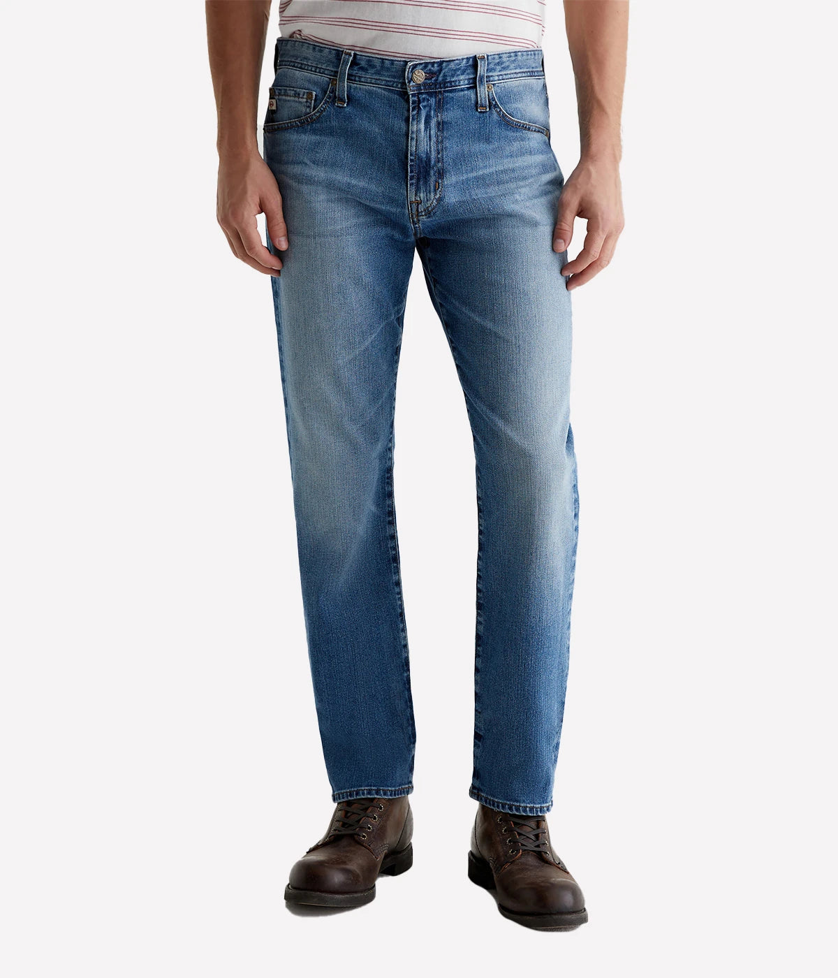 The Graduate men's straight jean, featuring a slim mid-rise waist with a relaxed fit from hip to knee, tapering at the leg opening. Detailed measurements include a 10" front rise, 17" knee opening, 15.5" bottom opening, and 32" inseam.