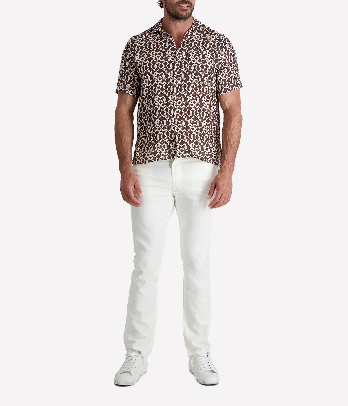 Osvaldo Trucchi short-sleeve Hawaiian shirt in breathable linen with a brown and white pattern. Features a relaxed camp collar and an easy, stylish fit for warm-weather wear.