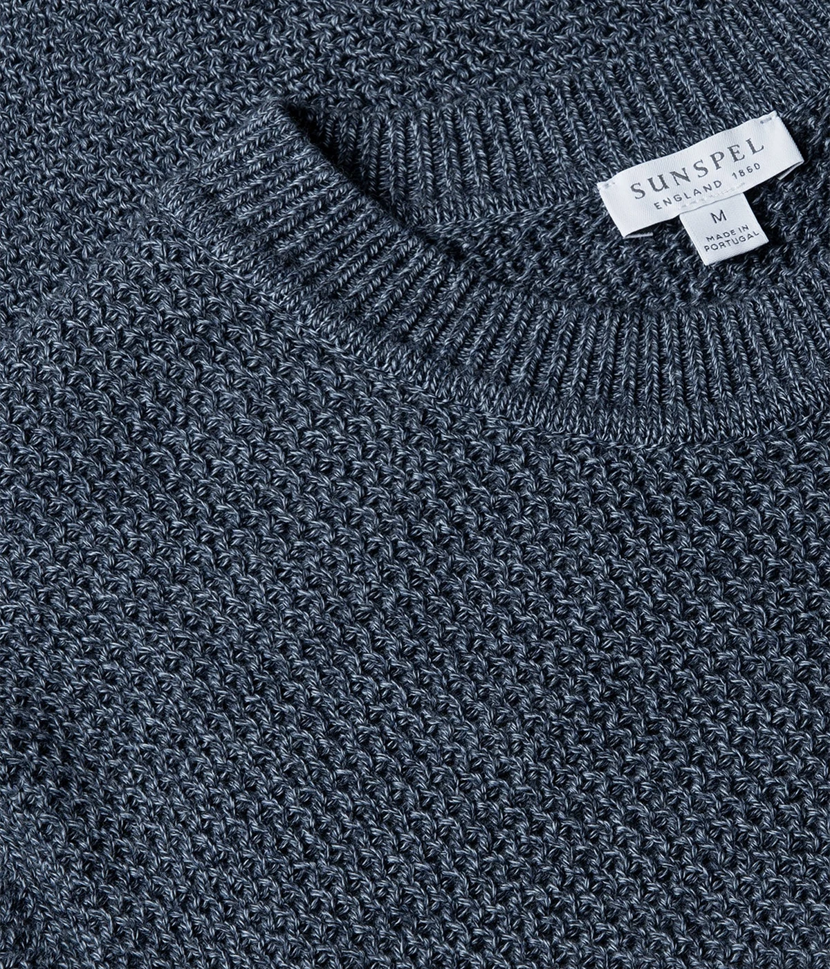 Honeycomb-knit cotton sweater with a soft, textured feel. Features a regular fit, ribbed trims, and a clean tubular seam at the neck for a refined finish.