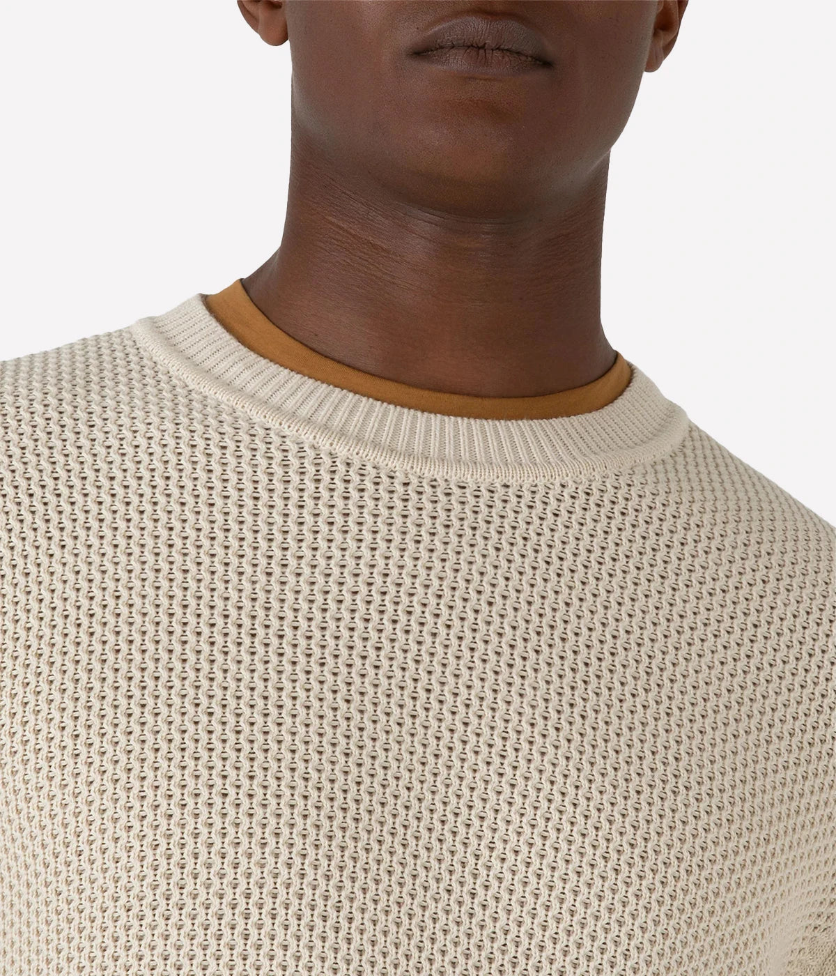 Ecru honeycomb-knit cotton sweater with ribbed trims and a clean tubular seam at the neck for a refined, effortless look.