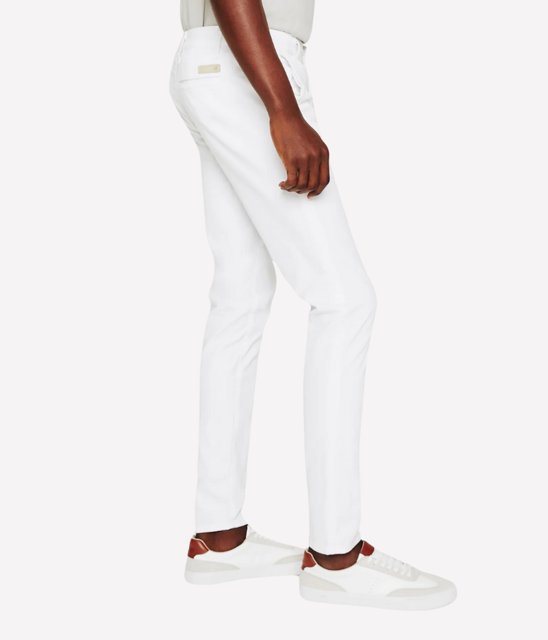 AG Jamison Chino in White—slim skinny men’s trouser with a tailored fit, tapered leg, and lightweight stretch sateen fabric for a refined yet comfortable finish. Features slash front pockets and buttoned welt back pockets.