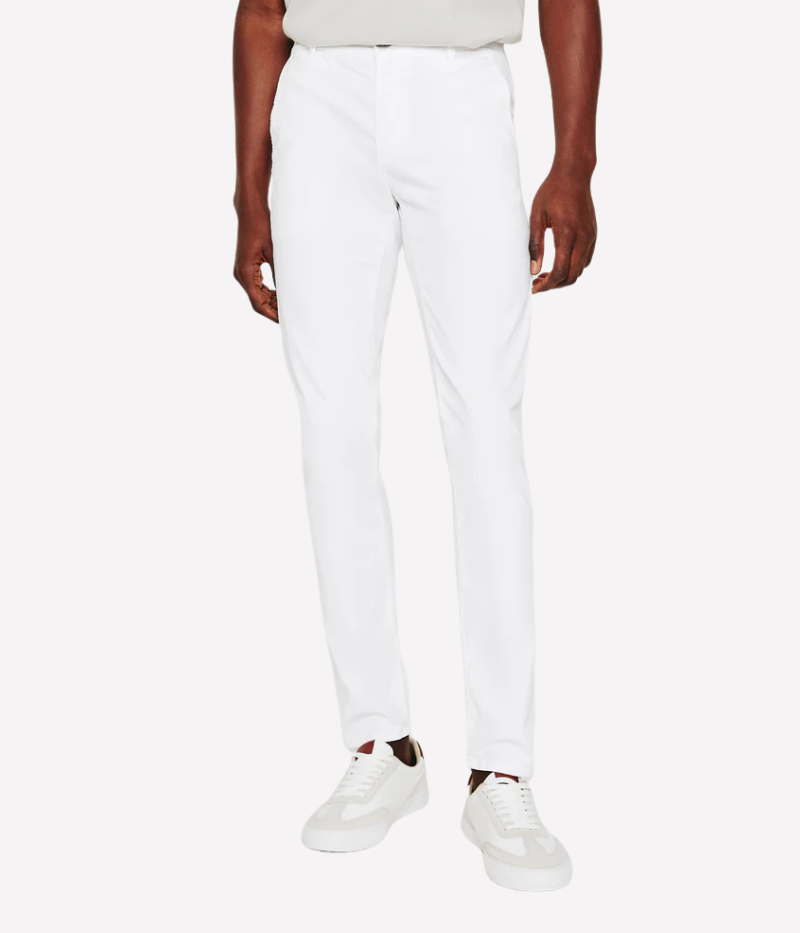 AG Jamison Chino in White—slim skinny men’s trouser with a tailored fit, tapered leg, and lightweight stretch sateen fabric for a refined yet comfortable finish. Features slash front pockets and buttoned welt back pockets.