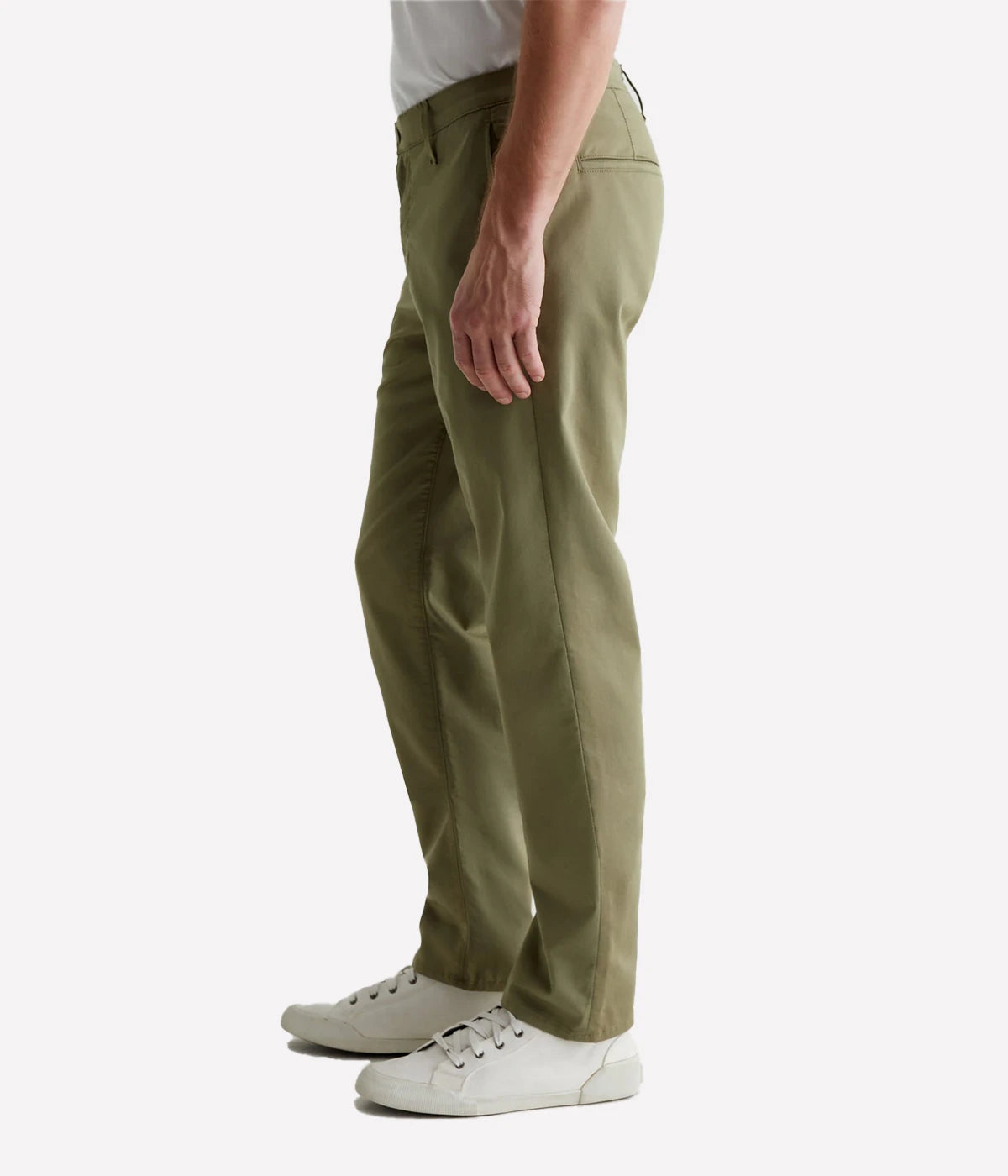 AG's Kullen slim-fit trousers in lightweight 5.9 oz. Airluxe™ Commuter Performance Sateen, featuring a refined texture and powerful stretch for comfort and shape retention. Designed with a 10 1/4" front rise, 17" knee opening, 14" bottom opening, and 32" inseam.