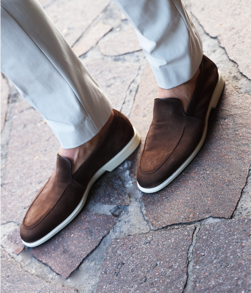 Malibu Loafer in brown, crafted from buttery-soft burnished suede with a flexible rubber sole. Features a leather upper and synthetic lining, combining luxury, style, and all-day comfort. Made in Italy.