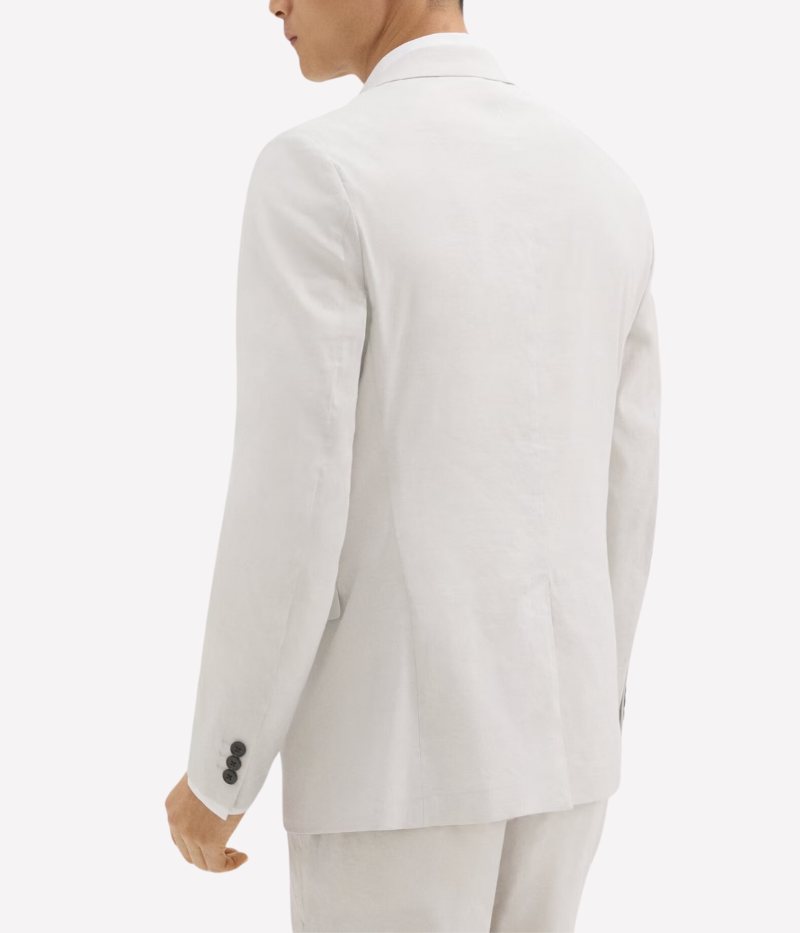 Theory Clinton Blazer in Good Linen, featuring a semi-constructed two-button design, notch lapels, and flap pockets. Breathable, lightweight, and made with sustainable stretch linen for all-day comfort.