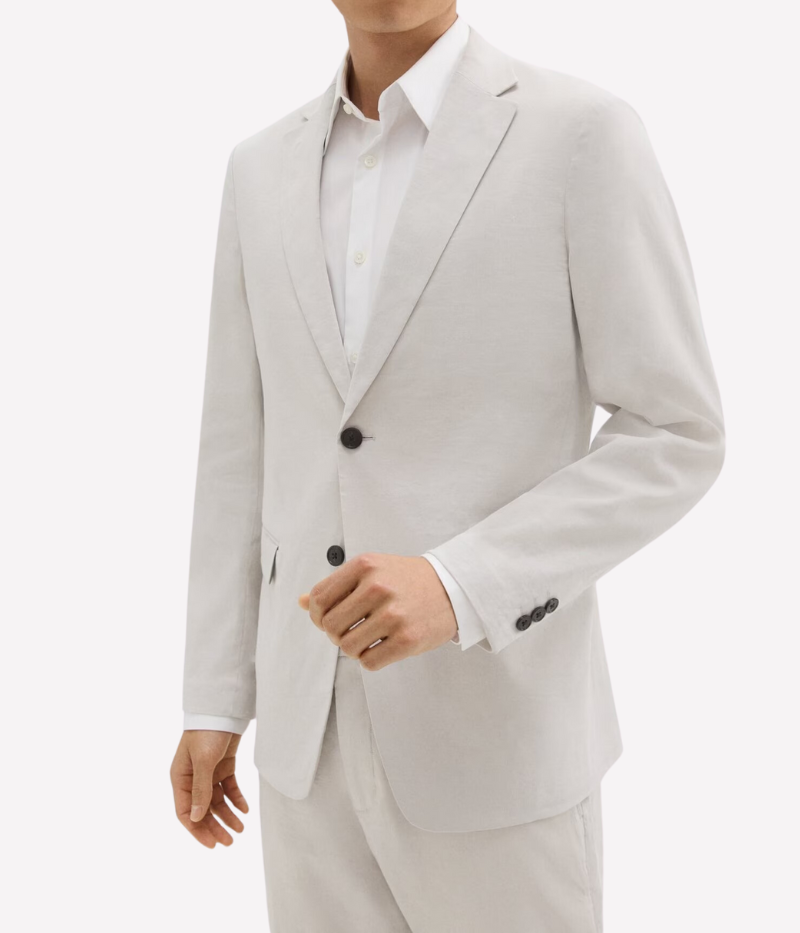 Theory Clinton Blazer in Good Linen, featuring a semi-constructed two-button design, notch lapels, and flap pockets. Breathable, lightweight, and made with sustainable stretch linen for all-day comfort.