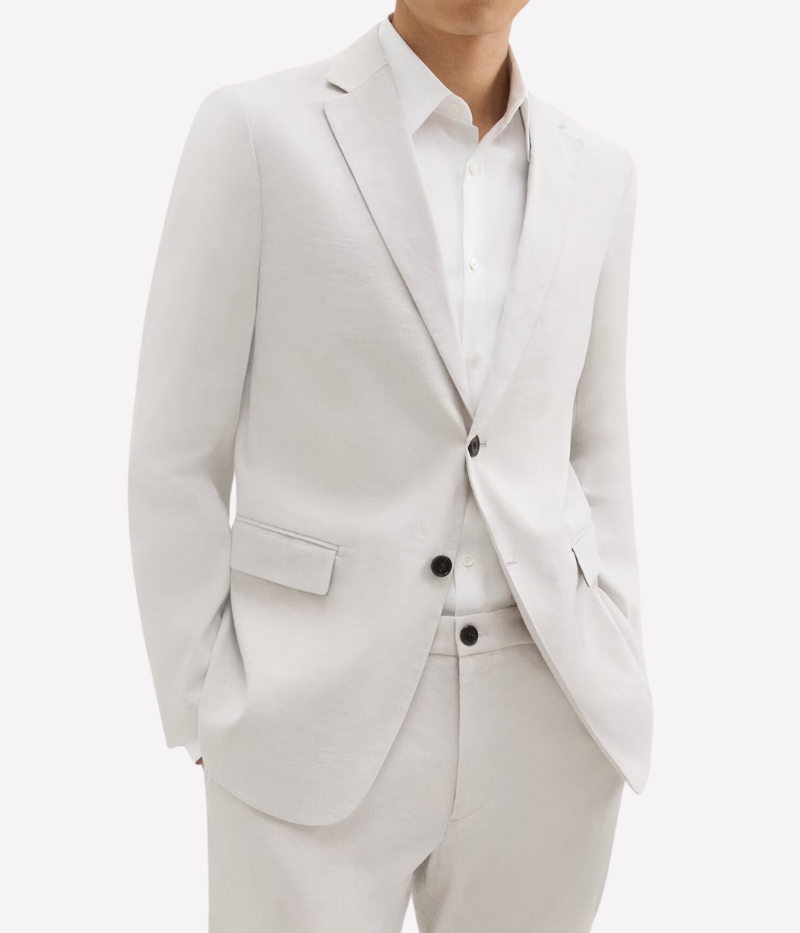 Theory Clinton Blazer in Good Linen, featuring a semi-constructed two-button design, notch lapels, and flap pockets. Breathable, lightweight, and made with sustainable stretch linen for all-day comfort.