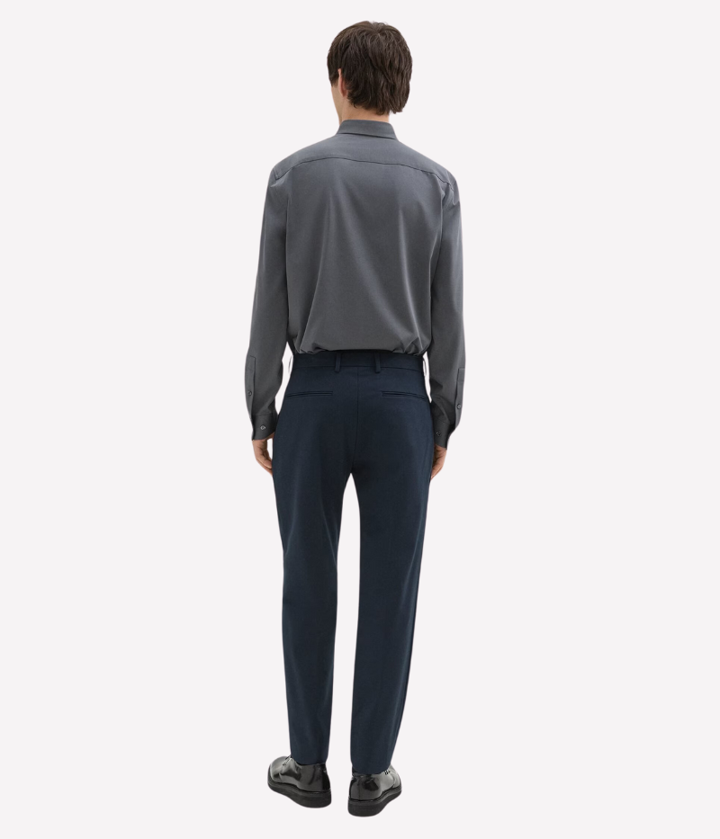 Theory Zaine Pant in Baltic, featuring a slim-straight leg, mid-rise fit, and crafted from bi-stretch twill for lasting shape and comfort. Made from a sustainable blend of recycled nylon and organic cotton.