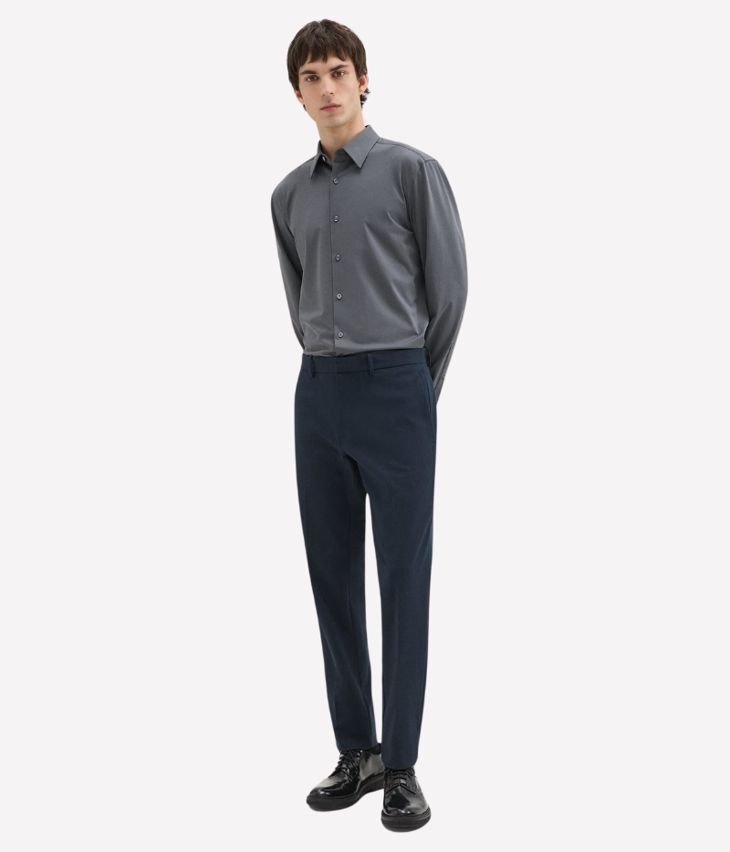 Theory Zaine Pant in Baltic, featuring a slim-straight leg, mid-rise fit, and crafted from bi-stretch twill for lasting shape and comfort. Made from a sustainable blend of recycled nylon and organic cotton.