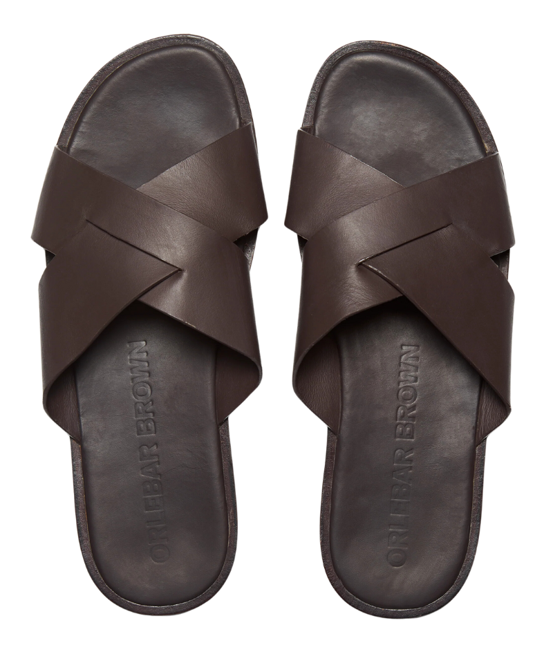 Men’s MURO sandals in luxury leather with wide criss-crossed straps, debossed Orlebar Brown logo on the padded insole, and flexible leather sole. Perfect for poolside lounging, beach walks, or casual summer outings.