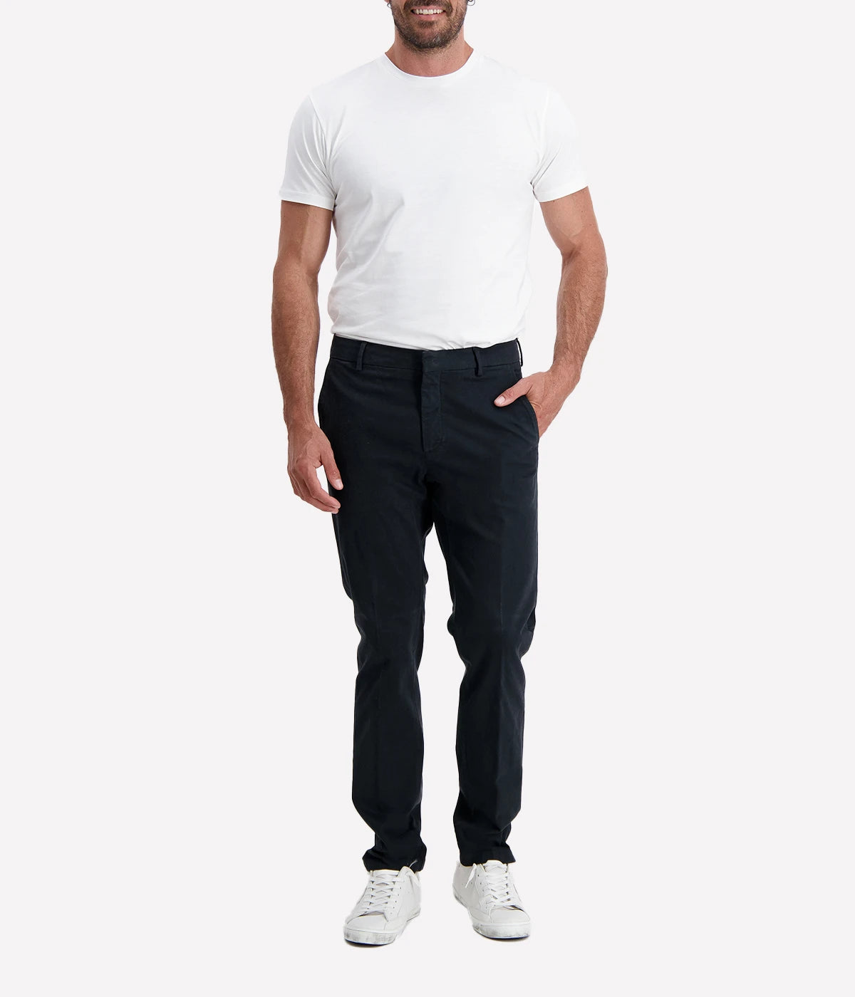 Slim-fit chino trousers crafted from stretch cotton for all-day comfort and ease of movement. Designed with a zip and button closure for a secure fit, front slant pockets for practicality, and welt back pockets for a refined finish. Perfect for both casual and smart occasions, these Italian-made chinos offer a sleek and sophisticated look.