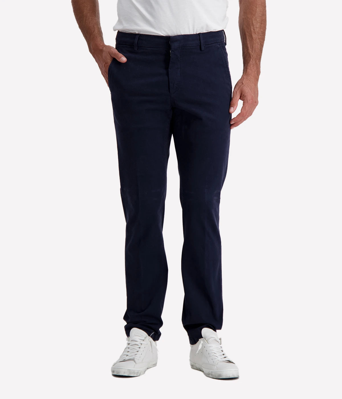 Slim fit chino trousers crafted from stretch cotton for a comfortable and flexible fit. Featuring a classic zip and button closure, front slant pockets, and welt pockets at the back for a polished and refined look. Perfect for both casual and formal occasions. Made in Italy. Material: 93% Cotton, 7% Elastane.