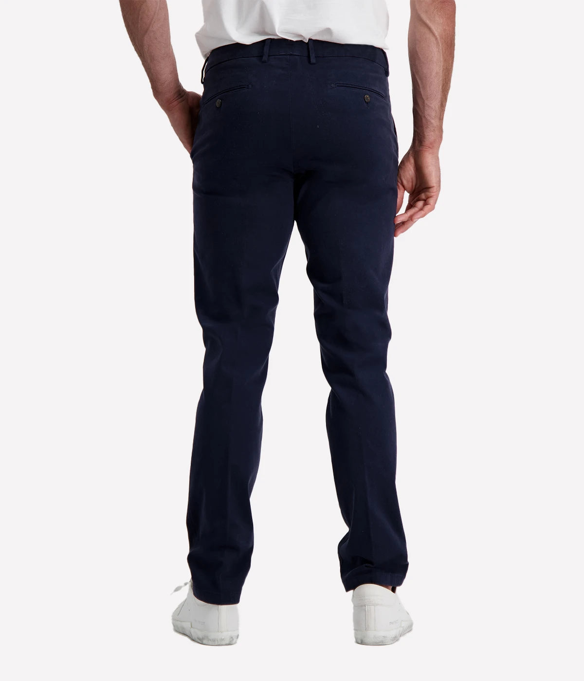 Slim fit chino trousers crafted from stretch cotton for a comfortable and flexible fit. Featuring a classic zip and button closure, front slant pockets, and welt pockets at the back for a polished and refined look. Perfect for both casual and formal occasions. Made in Italy. Material: 93% Cotton, 7% Elastane.