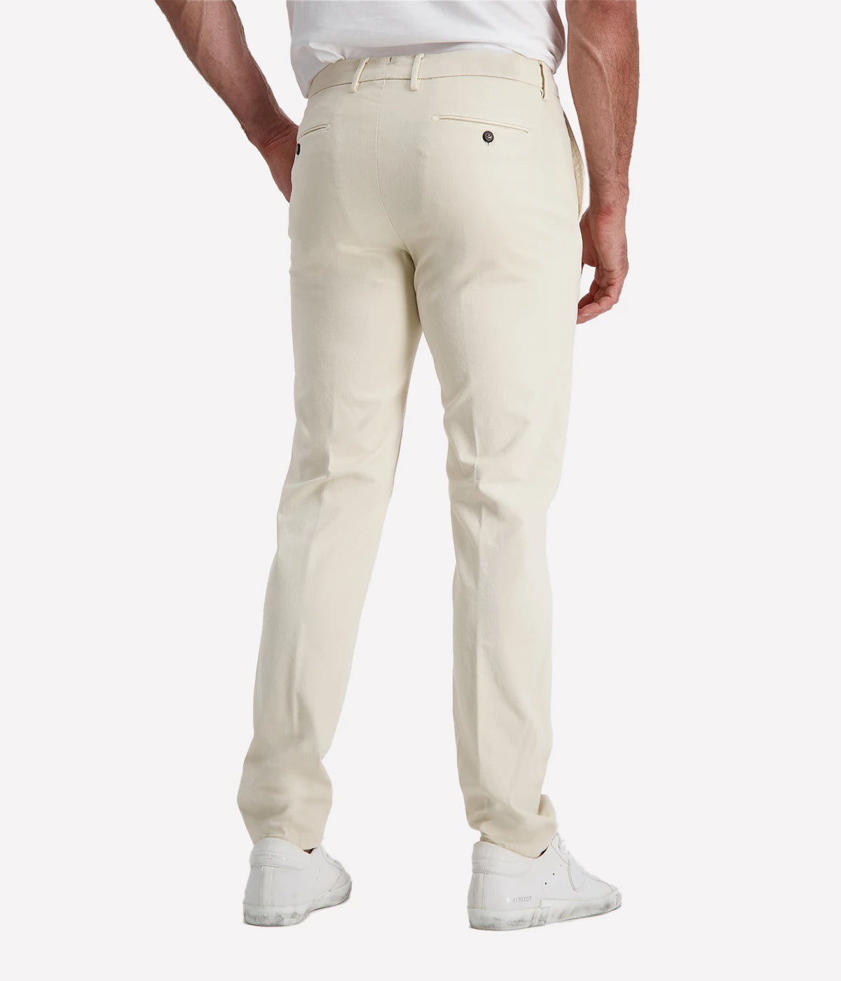 Slim-fit chino trousers crafted from stretch cotton for all-day comfort and ease of movement. Designed with a zip and button closure for a secure fit, front slant pockets for practicality, and welt back pockets for a refined finish. Perfect for both casual and smart occasions, these Italian-made chinos offer a sleek and sophisticated look.