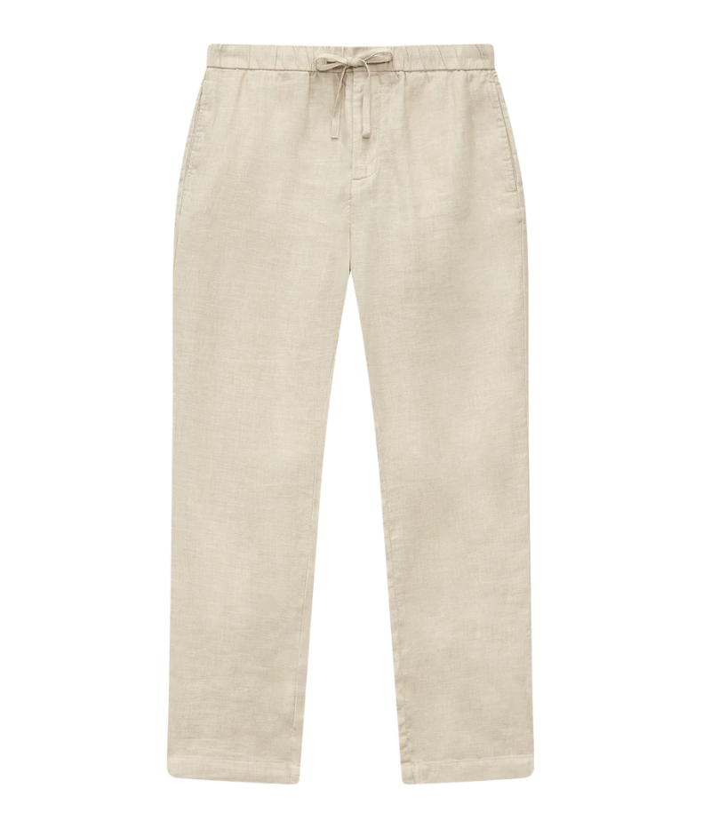 Frescobol Carioca Oscar Trousers in a slim fit design made from a cotton-linen blend. Featuring a sophisticated tapered leg, drawstring waist for comfort, and a zipper closure. The versatile trousers offer an elevated yet easy everyday style. Made in Portugal.