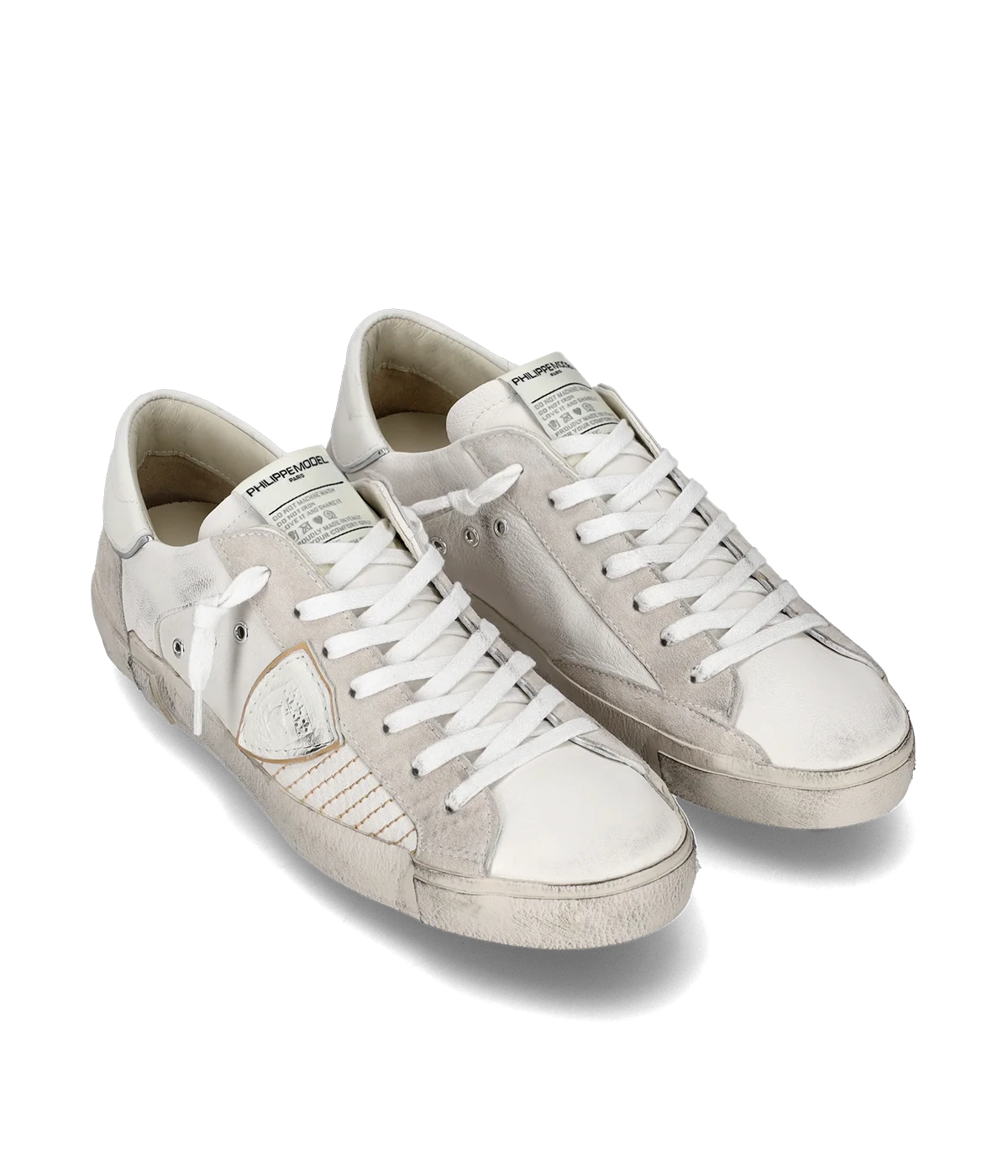 The PRSX sneaker in all-white puts a modern spin on ‘80s skate style with a worn-effect leather and suede upper, handcrafted rubber sole, and street-inspired details.