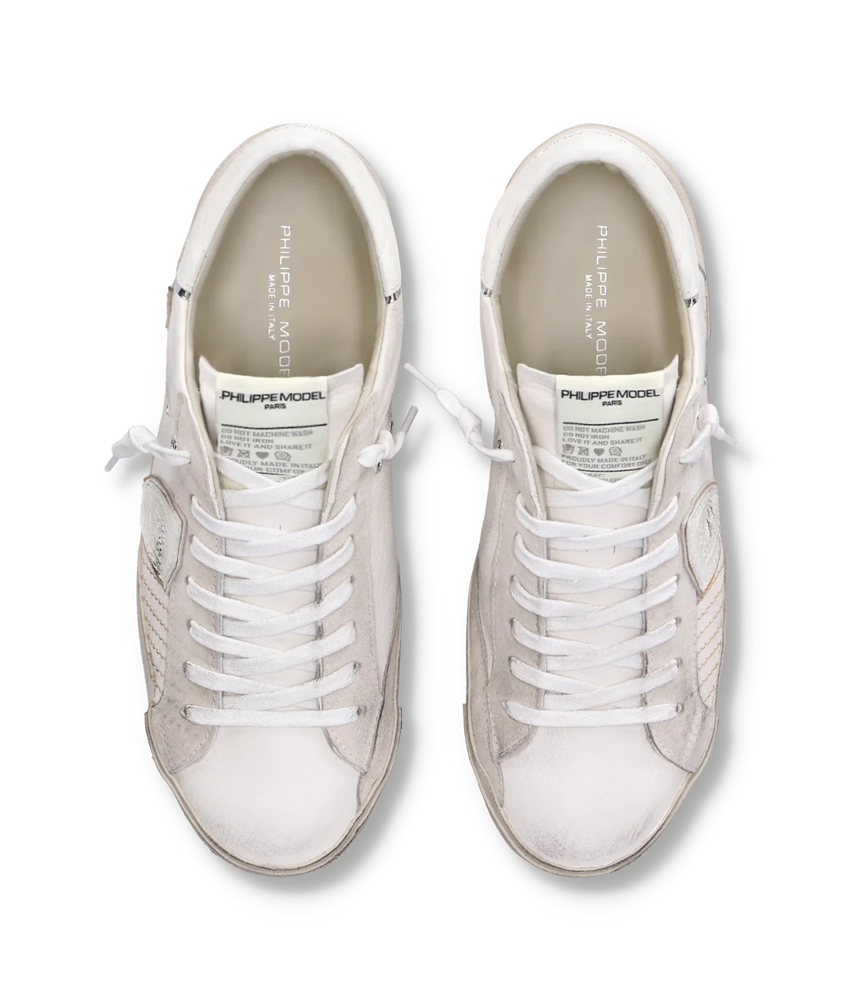 The PRSX sneaker in all-white puts a modern spin on ‘80s skate style with a worn-effect leather and suede upper, handcrafted rubber sole, and street-inspired details.