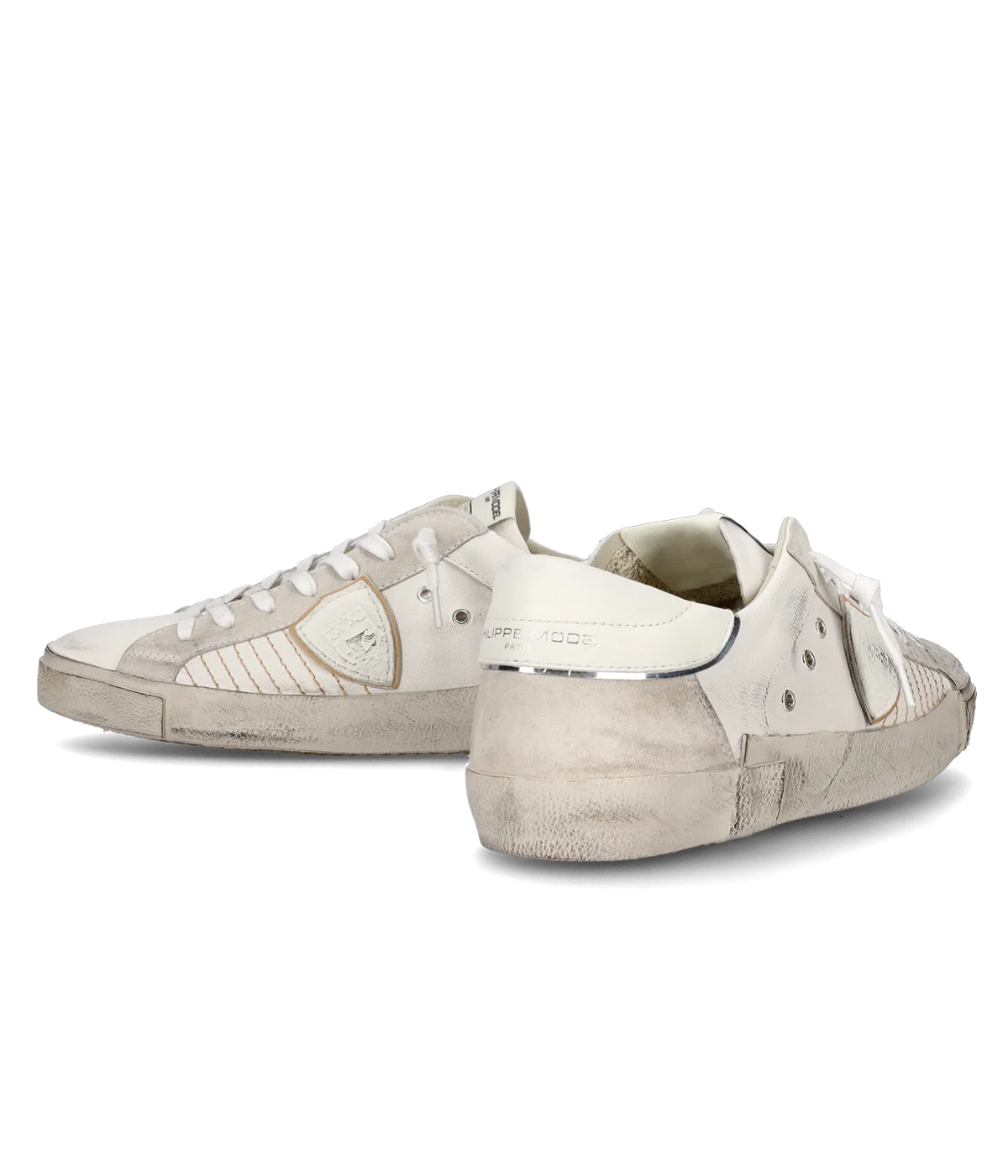 The PRSX sneaker in all-white puts a modern spin on ‘80s skate style with a worn-effect leather and suede upper, handcrafted rubber sole, and street-inspired details.