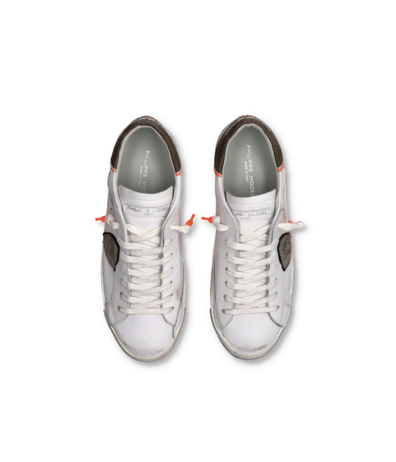 Overhead shot of the PRSX sneakers showcasing the white calfskin upper, dipped green laces, and sleek low-top design.