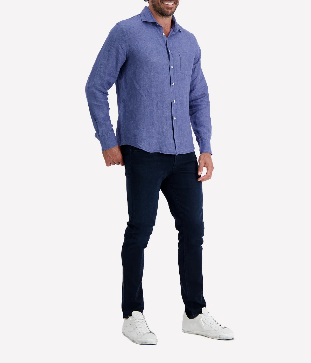 The Paul Shirt by Hartford in Denim is a lightweight linen button-down shirt with a relaxed fit. It features a classic button-up design, a casual collar, and long sleeves, making it perfect for warm weather and versatile styling. The denim color adds a casual yet sophisticated touch.