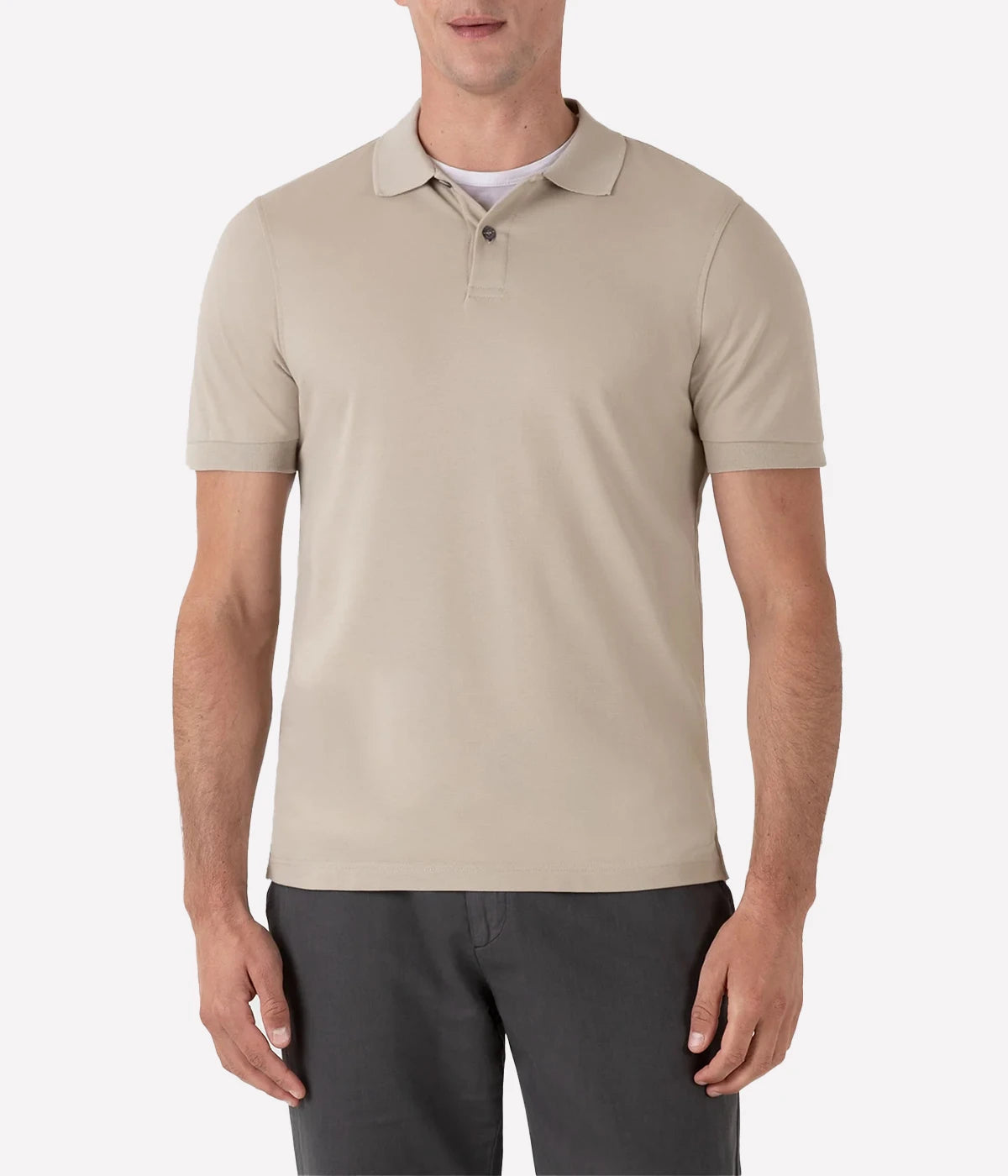 Ash grey piqué polo shirt for men made from Supima cotton. Features ribbed collar, side vents, and branded shell buttons for a sophisticated finish.