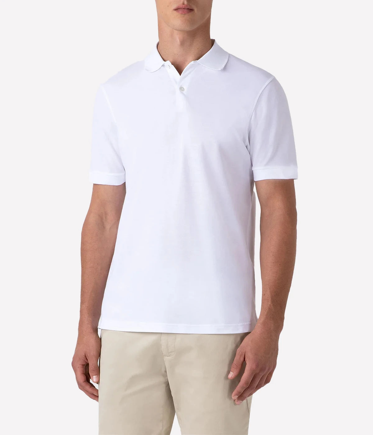 White piqué polo shirt for men made from premium Supima cotton. Ribbed collar, side vents, and branded shell buttons for a clean, stylish look.