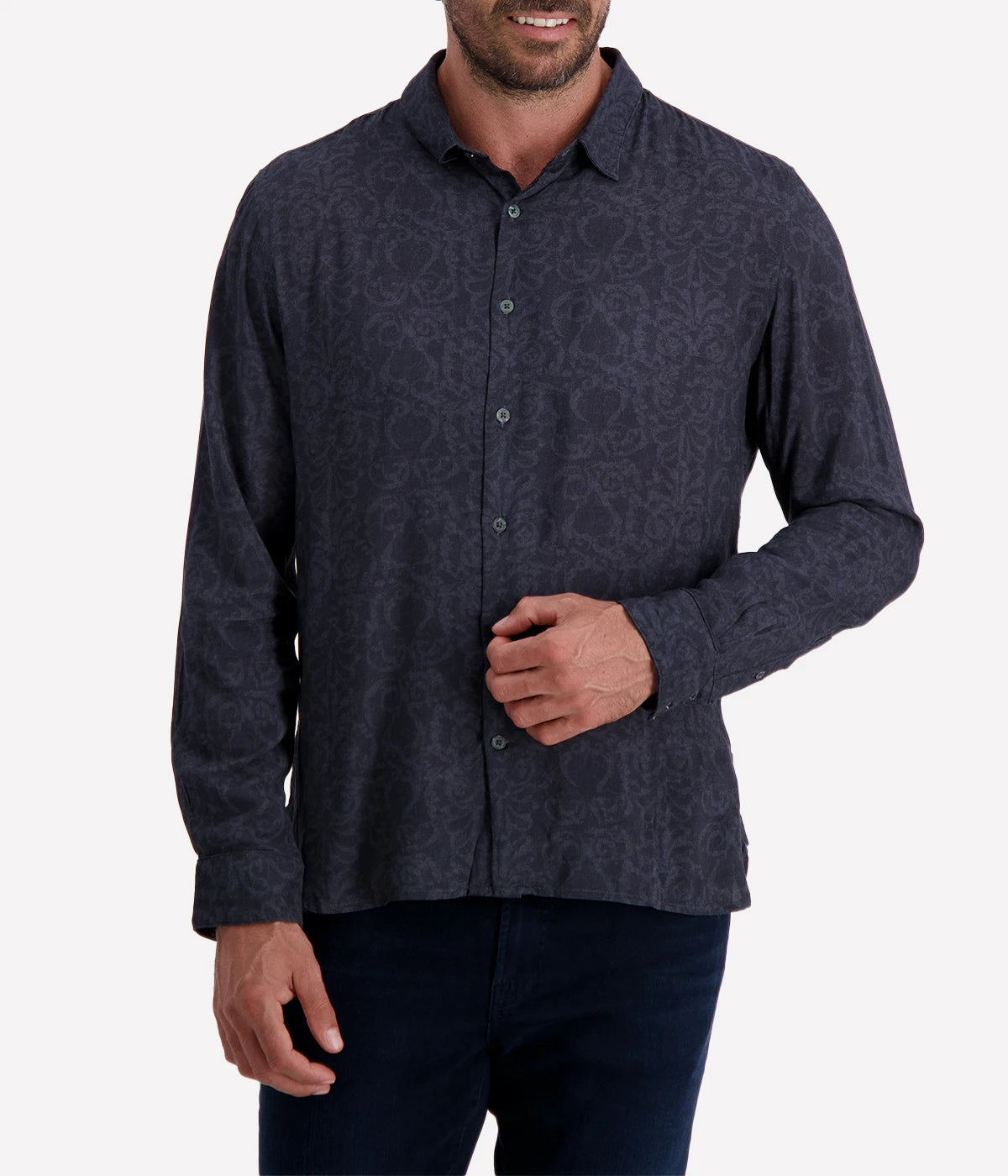 The Ross Shirt in black, featuring a subtle floral print, slim fit, classic collar, and lightweight modal fabric.