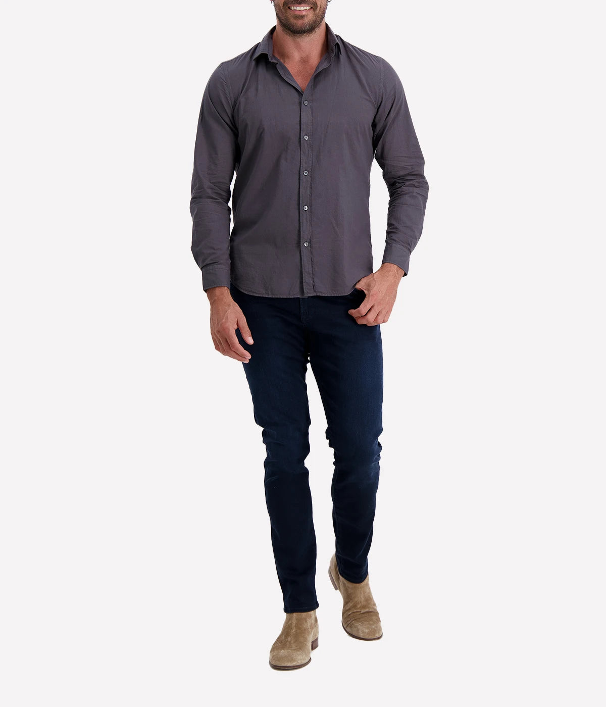 The Sammy Pat Woven Shirt in Charcoal by Hartford features a relaxed fit and soft cotton fabric. The shirt showcases a classic button-down design and a subtle woven texture in a versatile deep charcoal hue, perfect for both casual and smart-casual occasions.