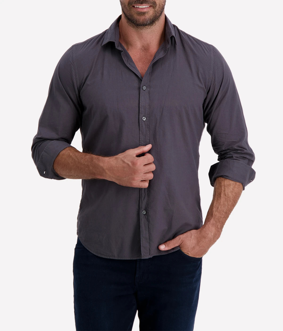 The Sammy Pat Woven Shirt in Charcoal by Hartford features a relaxed fit and soft cotton fabric. The shirt showcases a classic button-down design and a subtle woven texture in a versatile deep charcoal hue, perfect for both casual and smart-casual occasions.