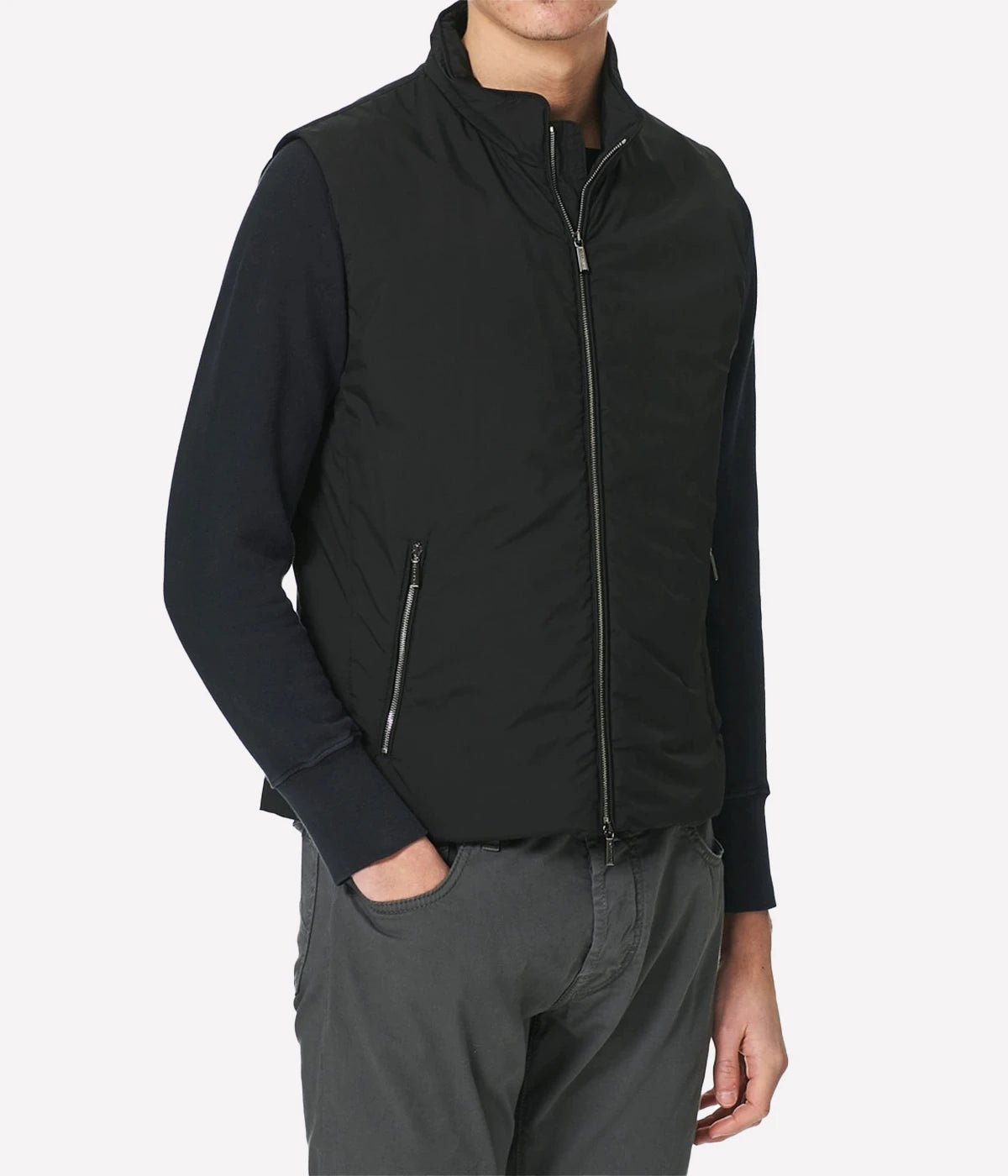 Senio Vest in Black by MooRER, featuring lightweight water-repellent fabric, synthetic feather-effect padding, double-zip front closure, and zippered pockets. Made in Italy.