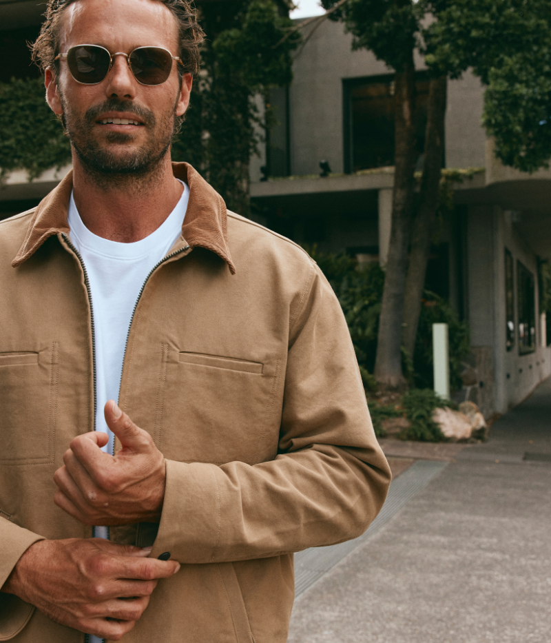 Khaki service jacket with corduroy collar and on-seam pockets, made from heavyweight bedford twill fabric for durability and a stylish, timeless look.