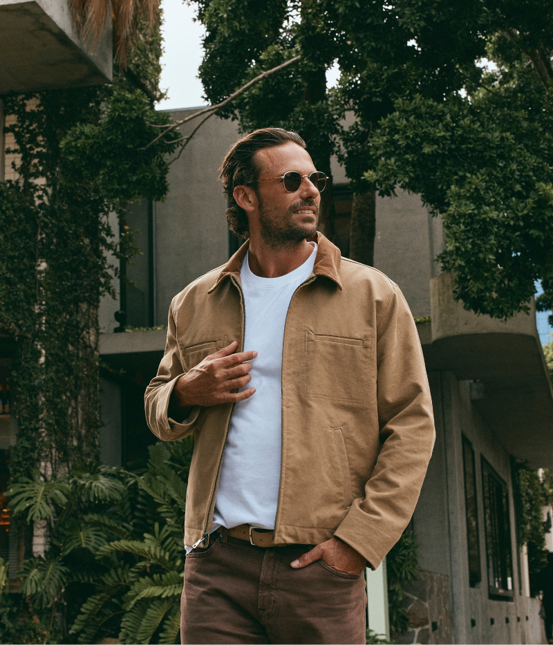 Khaki service jacket with corduroy collar and on-seam pockets, made from heavyweight bedford twill fabric for durability and a stylish, timeless look.