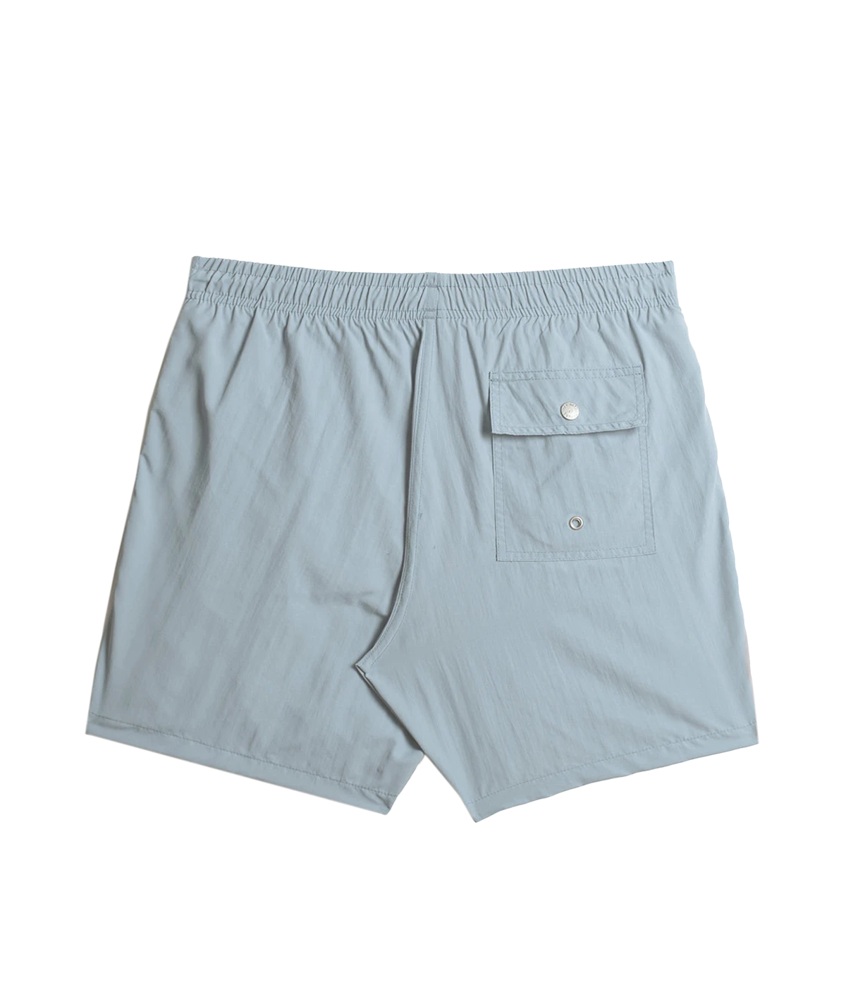 Back view of Bather solid swim trunks, showing the snap-closure back pocket and clean, tailored design. The ultra-fine mesh liner provides quick-dry functionality and four-way stretch for enhanced comfort.