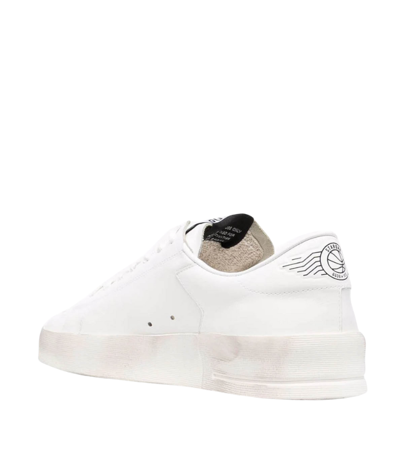 White Golden Goose Stardan sneakers in 100% cowhide leather, featuring a retro 90s basketball-inspired design. Minimalist all-white finish for a versatile, everyday look. Made in Italy.