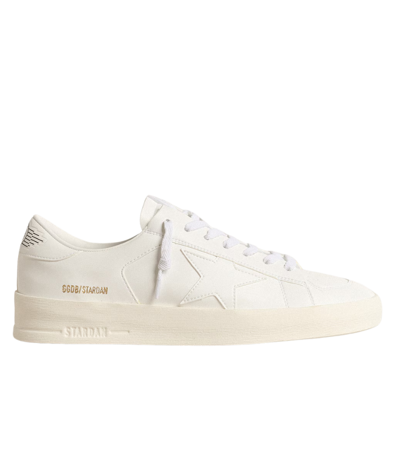 White Golden Goose Stardan sneakers in 100% cowhide leather, featuring a retro 90s basketball-inspired design. Minimalist all-white finish for a versatile, everyday look. Made in Italy.