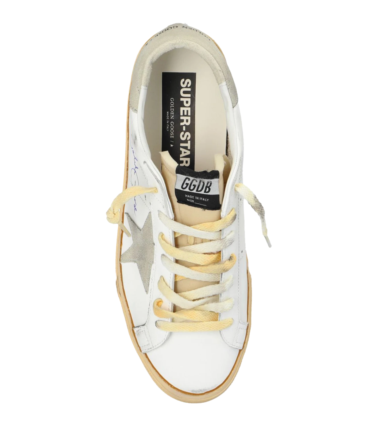 The Golden Goose Super Star Sneakers feature a distressed leather finish with laced closure and signature branding on the tongue, offering a stylish, lived-in look.