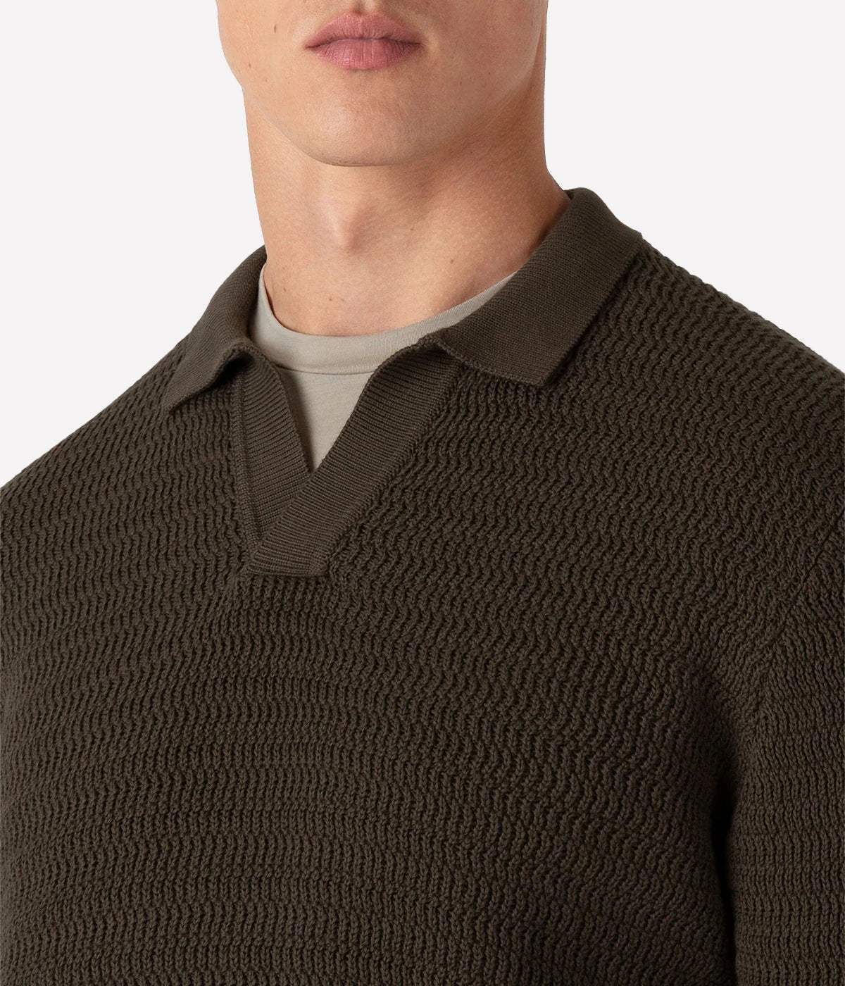 Khaki open-stitch polo in luxurious Egyptian cotton, featuring a buttonless collar, ribbed trims, and a soft, breathable feel.